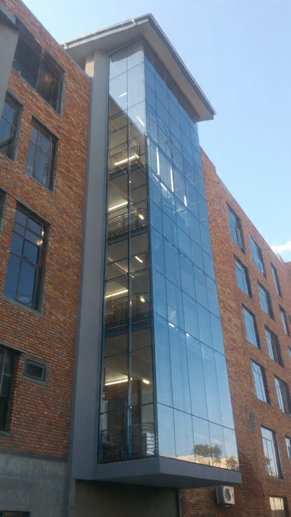 Commercial aluminium curtain walling Zimbabwe, aluminium curtain wall cost Zimbabwe, commercial curtain walling, aluminium and glass Zimbabwe, Accend Aluminium & Glass, aluminium façade Zimbabwe, glass curtain wall Zimbabwe, curtain wall installation Zimbabwe, aluminium curtain wall pricing, commercial building façade, aluminium curtain wall systems, thermally broken curtain wall, structural glazed curtain wall, aluminium curtain wall supplier, aluminium curtain wall company, curtain wall maintenance, sustainable aluminium façade, curtain wall design Zimbabwe, aluminium façade cost, aluminium glass façades